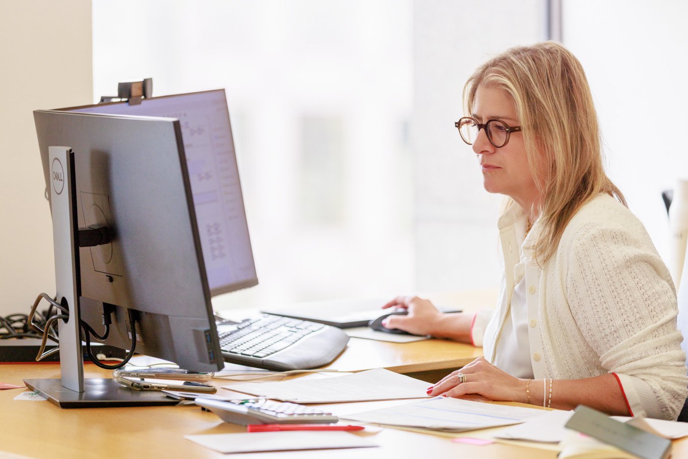 Business Branding 51 Person working at a desk.