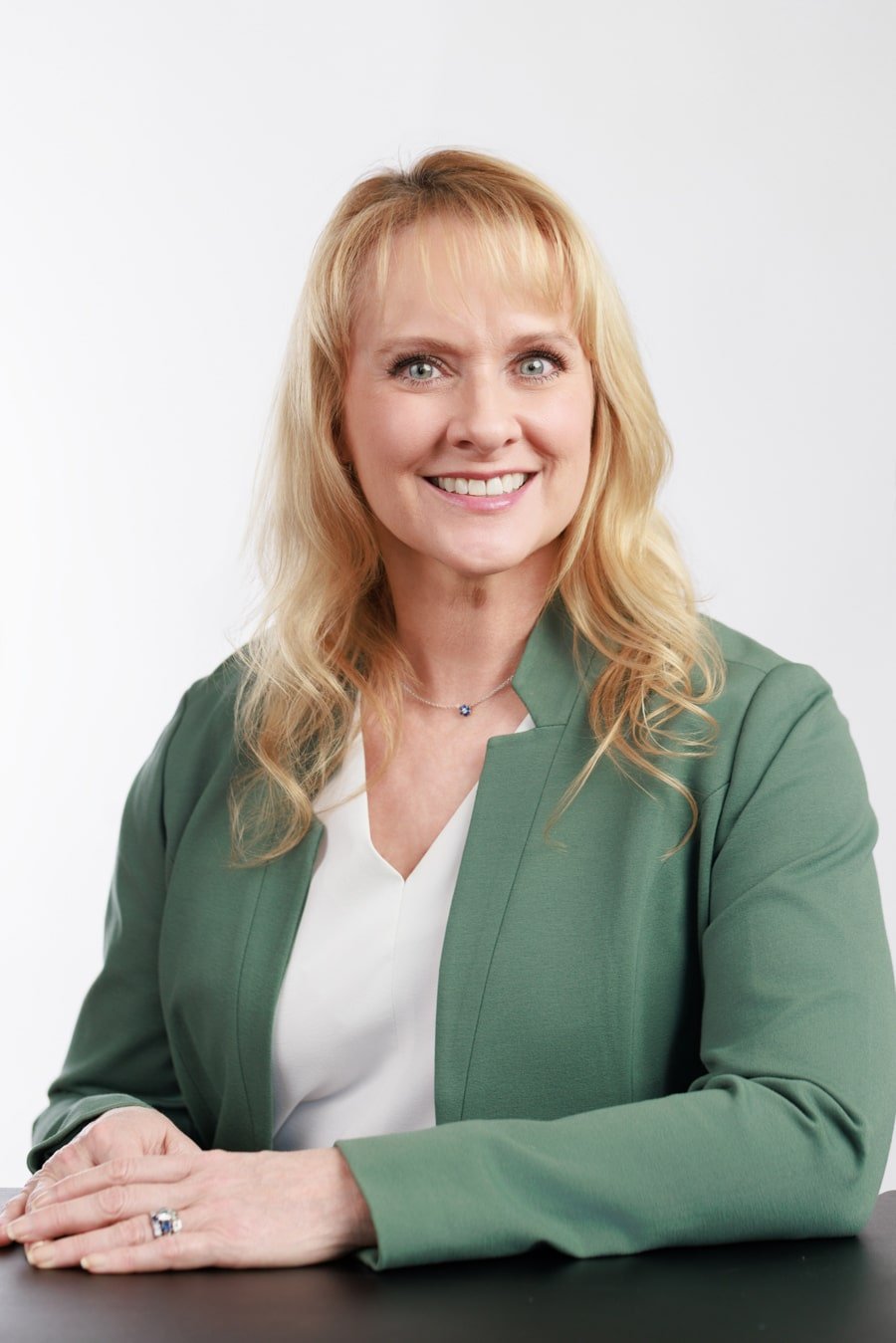 Corporate headshot for women in a warm-toned outfit — professional portrait photography Bay Area